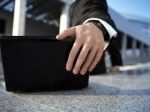 7549530-businessman-closing-a-laptop